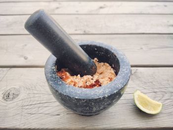 High angle view of mortar and pestle