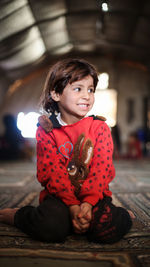 A cute little girl in a syrian refugee camp. 