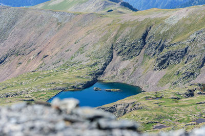 Scenic view of lake against mountain range