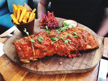Close-up of meat served on table
