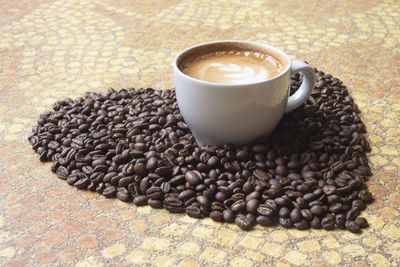 High angle view of coffee cup on table