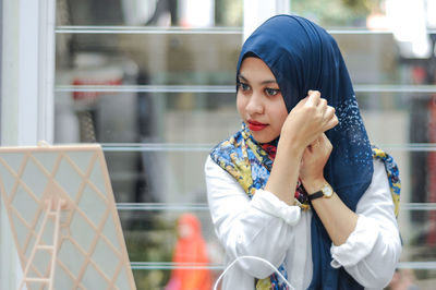 Young woman looking at camera