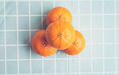 High angle view of orange fruit on floor