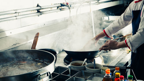 Man preparing food in kitchen