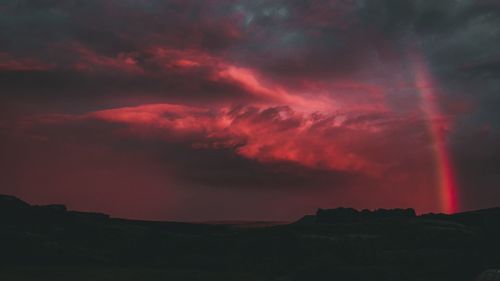 Low angle view of dramatic sky during sunset