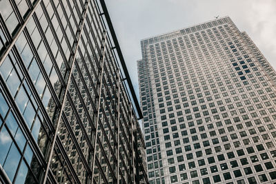 Low angle view of modern buildings against sky