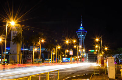 Light trails on city street at night