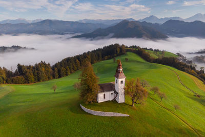 Scenic view of landscape and mountains against sky