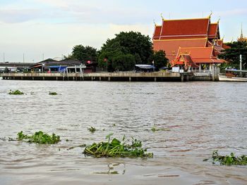 Scenic view of city against sky