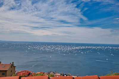 High angle view of sea with a biggest boat sailing competition