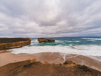 Scenic view of beach against sky