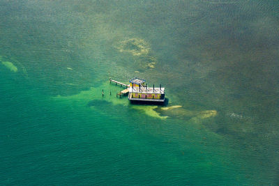 High angle view of ship sailing on sea