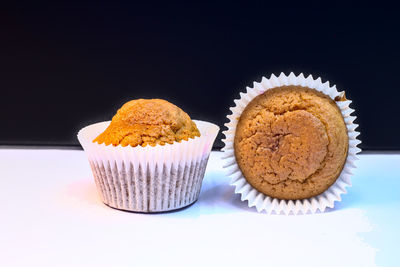 Close-up of cupcakes against white background