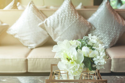 Close-up of white flower vase on table