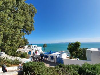 Scenic view of sea against blue sky