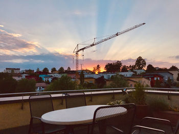 Commercial dock against sky during sunset