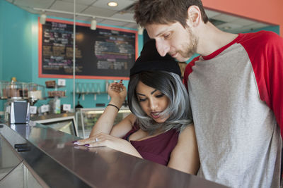 Young couple at a diner.