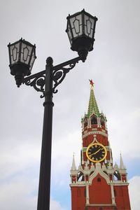 Low angle view of clock tower against sky