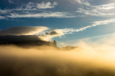 Scenic view of mountains against sky during sunset