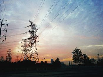 Trees against sky during sunset