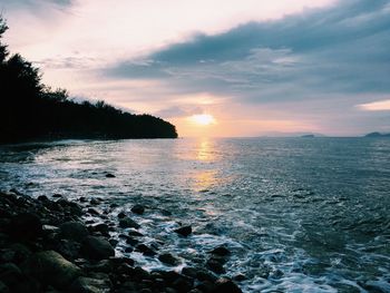 Scenic view of sea at sunset