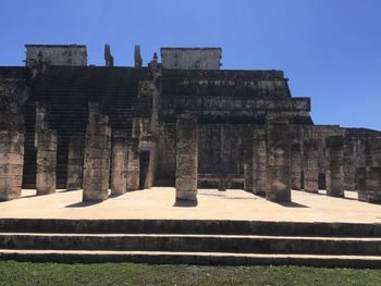 Low angle view of old ruins against clear sky