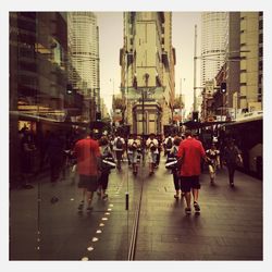 Woman walking on city street