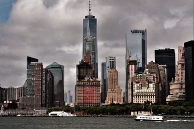 Modern buildings in city against sky