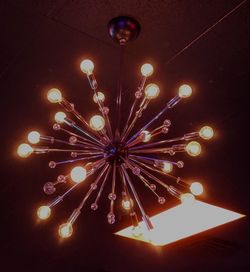 Low angle view of illuminated chandelier