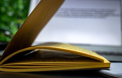 Close-up of open book on table