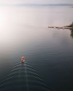 High angle view of boat on sea against sky