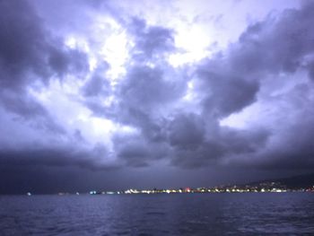 Scenic view of sea against cloudy sky