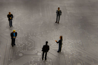 High angle view of people walking in rain