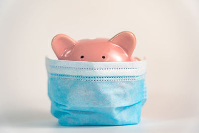 Close-up of blue toy against white background