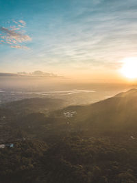 Scenic view of landscape against sky during sunset