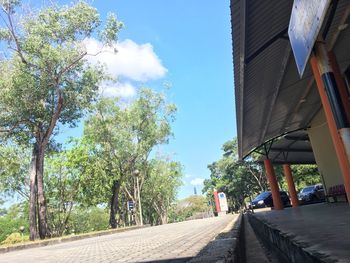 Street amidst buildings against sky