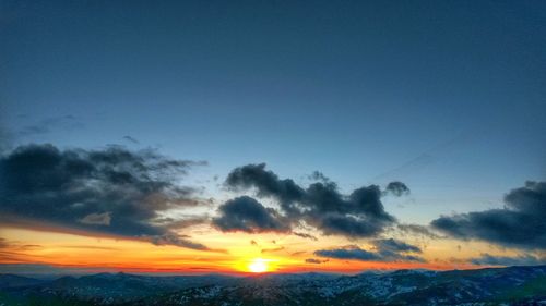 Scenic view of landscape at sunset