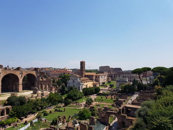 Buildings in city against clear sky - roman forum, rome, italy