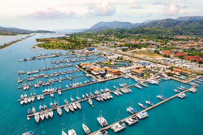 Aerial view of boats in harbor in lefkada city