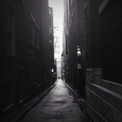 Narrow alley along buildings
