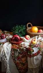 Close-up of orange fruits in basket