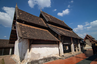 Low angle view of old building against sky