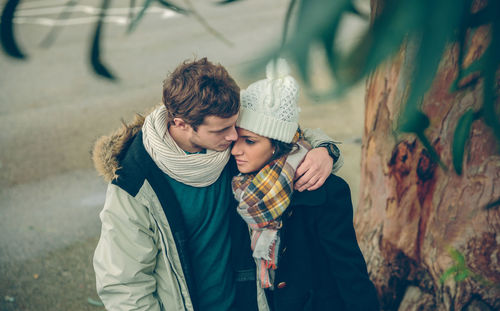 Young couple kissing outdoors