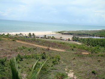 Scenic view of beach against sky