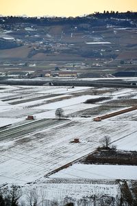 Scenic view of field against sky during winter