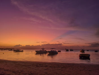 Scenic view of beach against purple sky during sunset in mauritius 