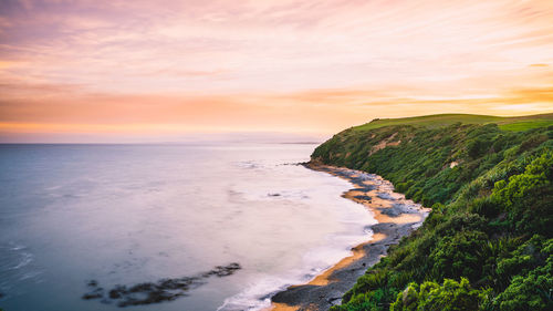 Scenic view of sea against sky during sunset