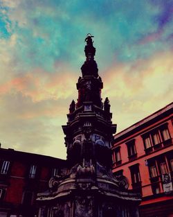 Low angle view of statue against sky