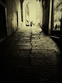 Narrow alley along buildings