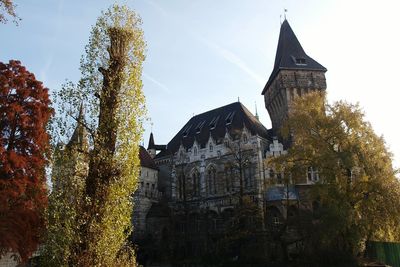 Low angle view of tower in city